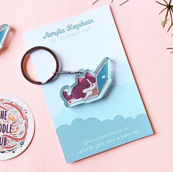 Sleeping cat on laptop Acrylic Keychain